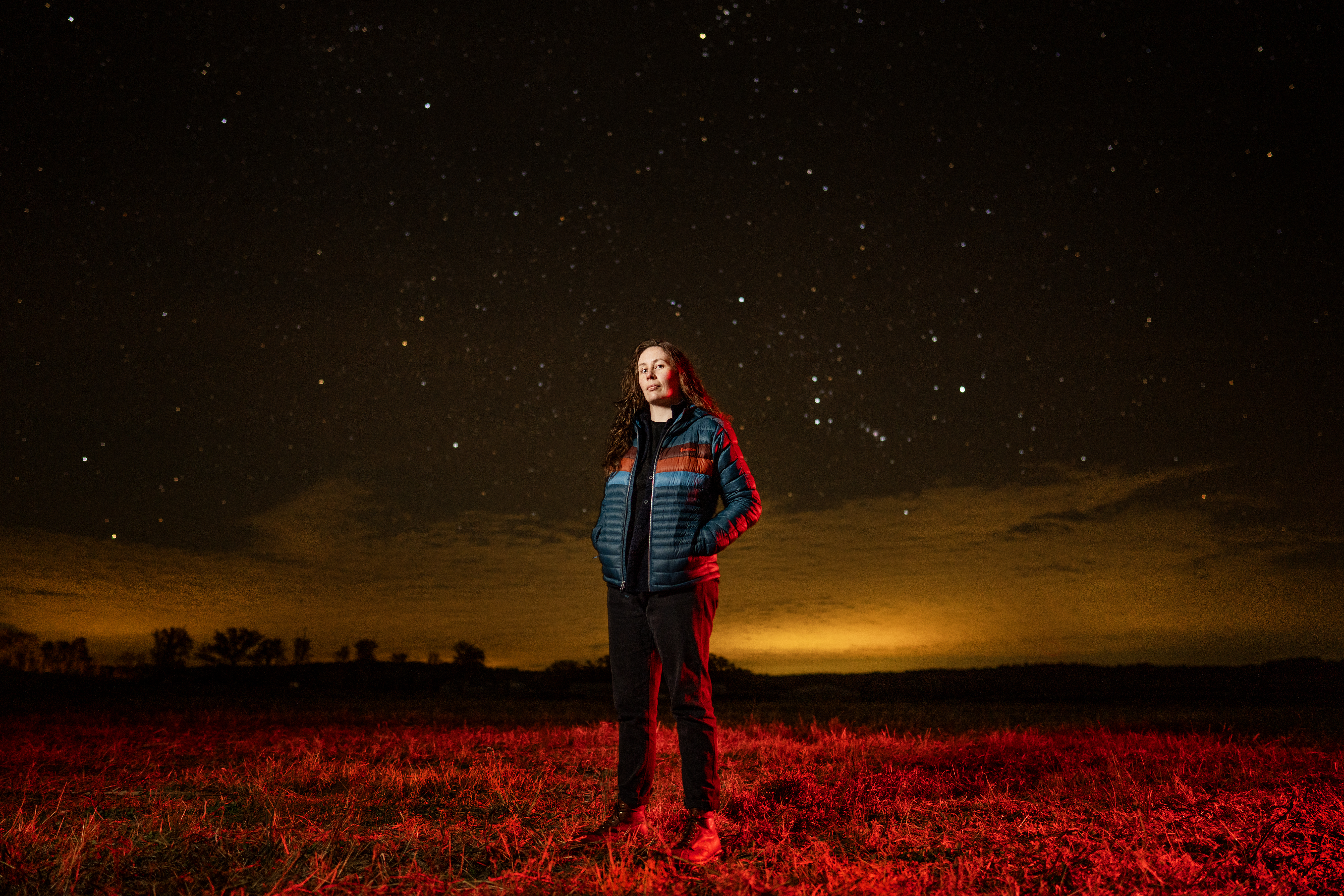 Cassandra Hall in a field.