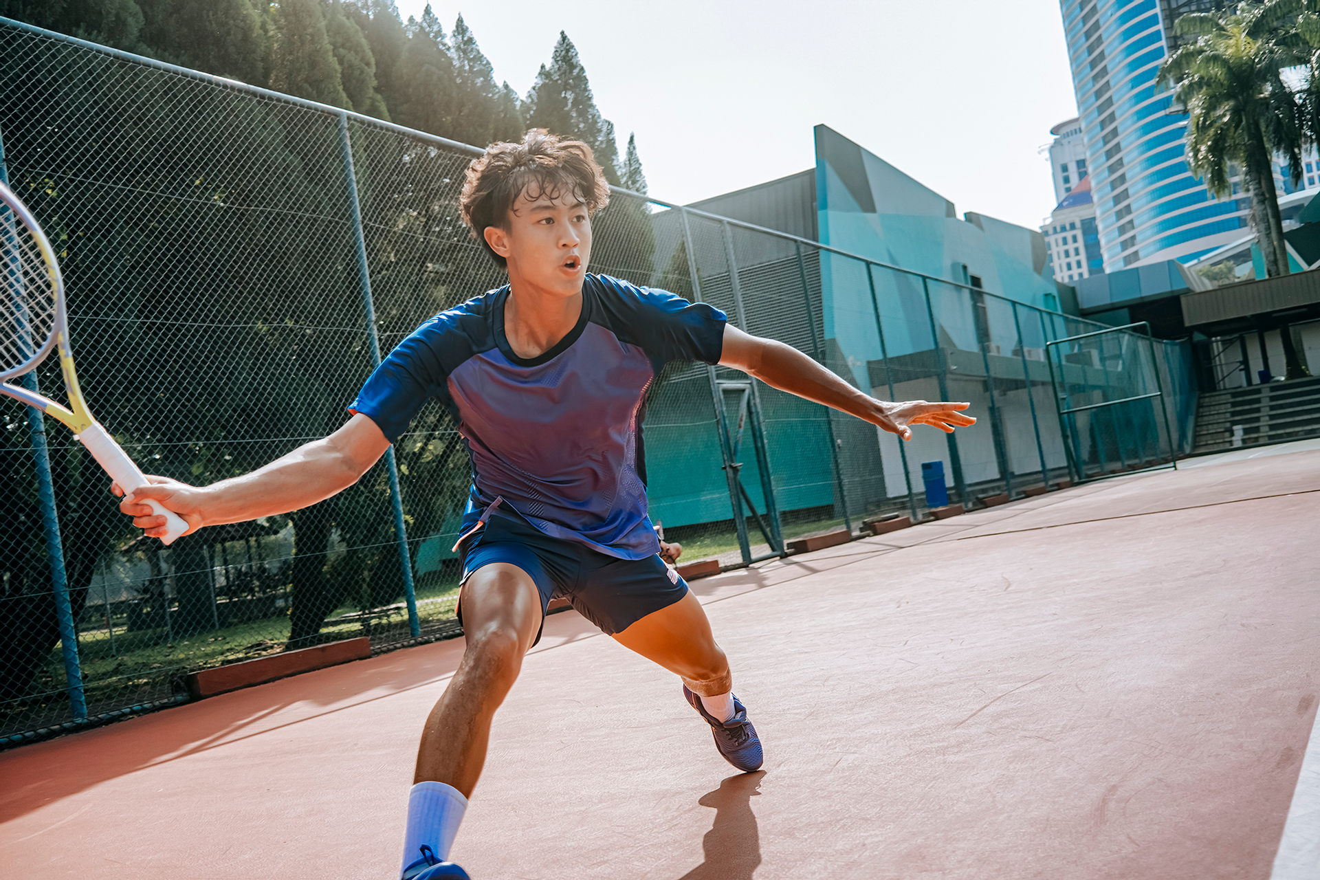 photo of man playing tennis, day, with racquet, sky