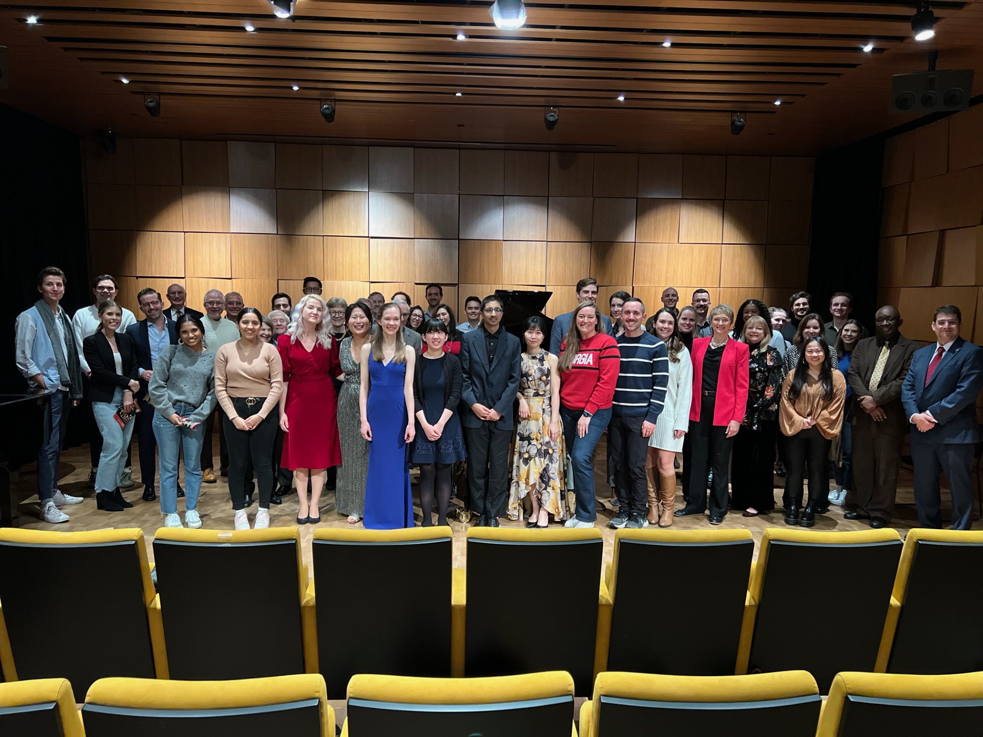 group photo of people on stage