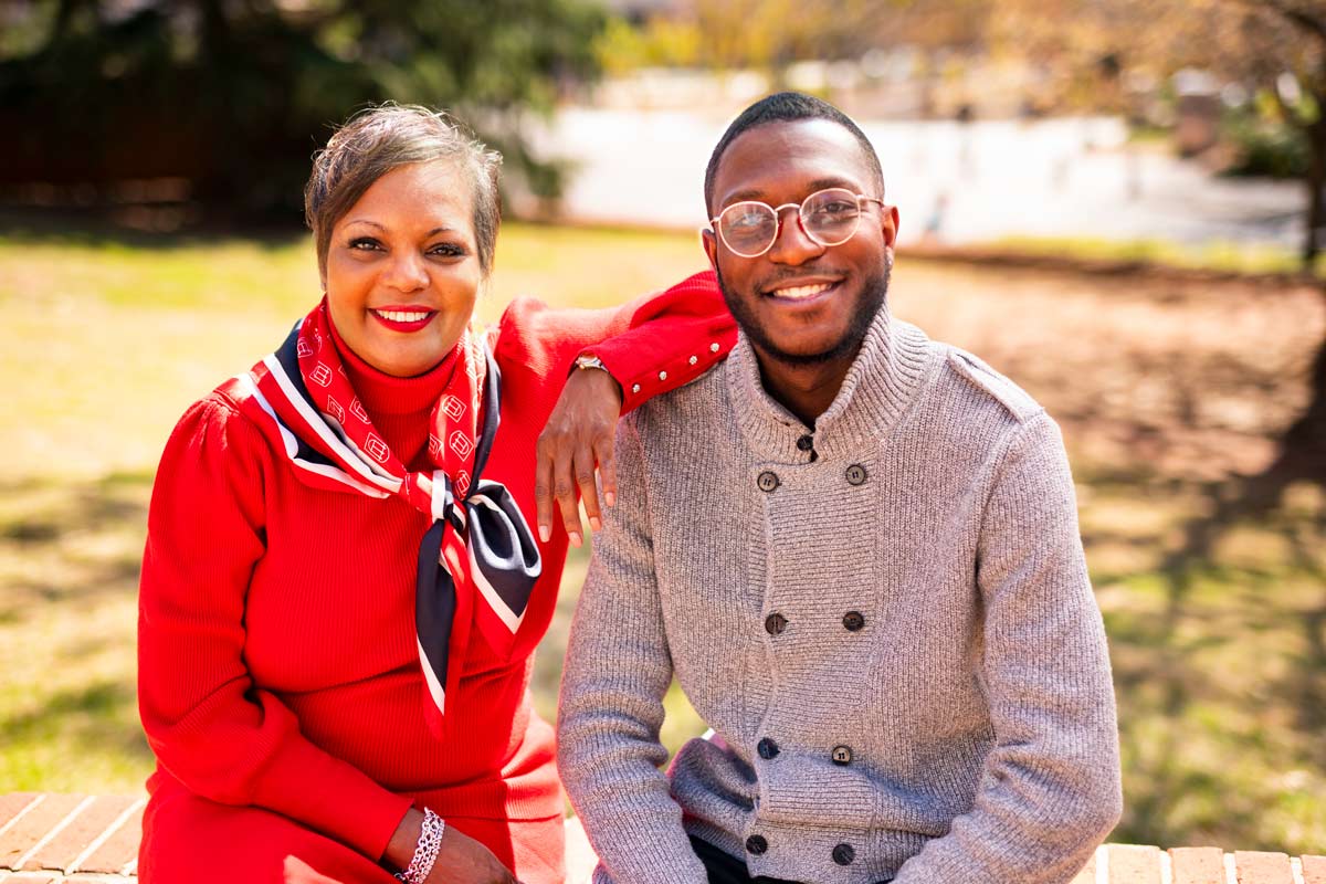 photo of two people, outdoors, day