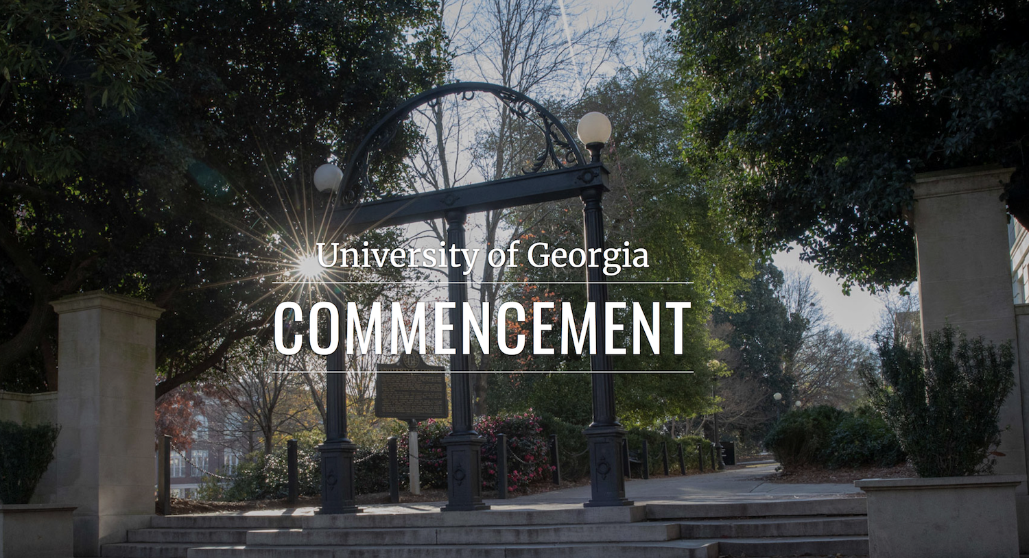 photo of arch in sunlight with white letter graphic